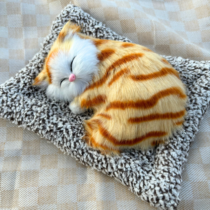Cute & Adorable Sleeping Cat on Soft Bed